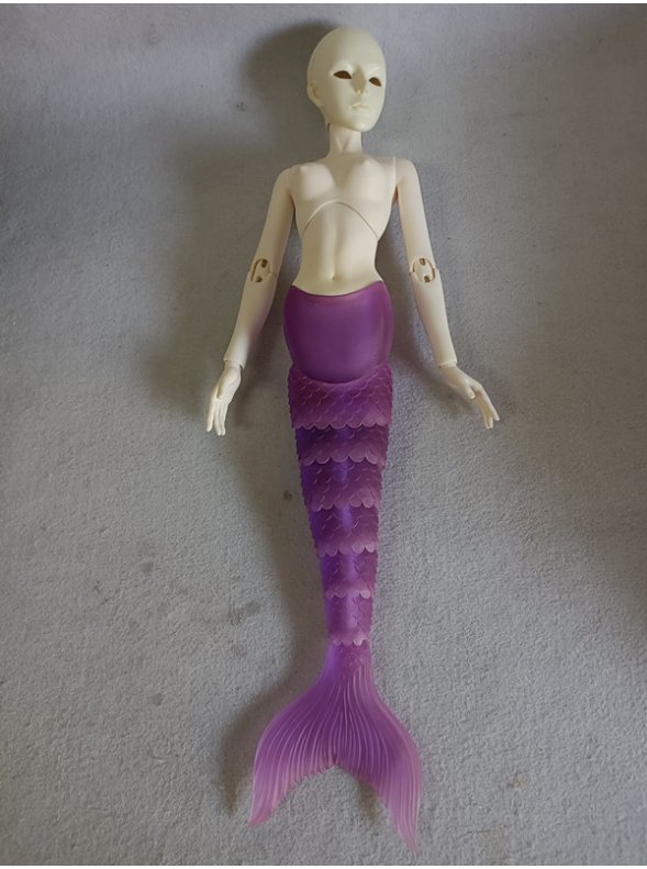 A Mermaid Iris girl with lilac transparent tail